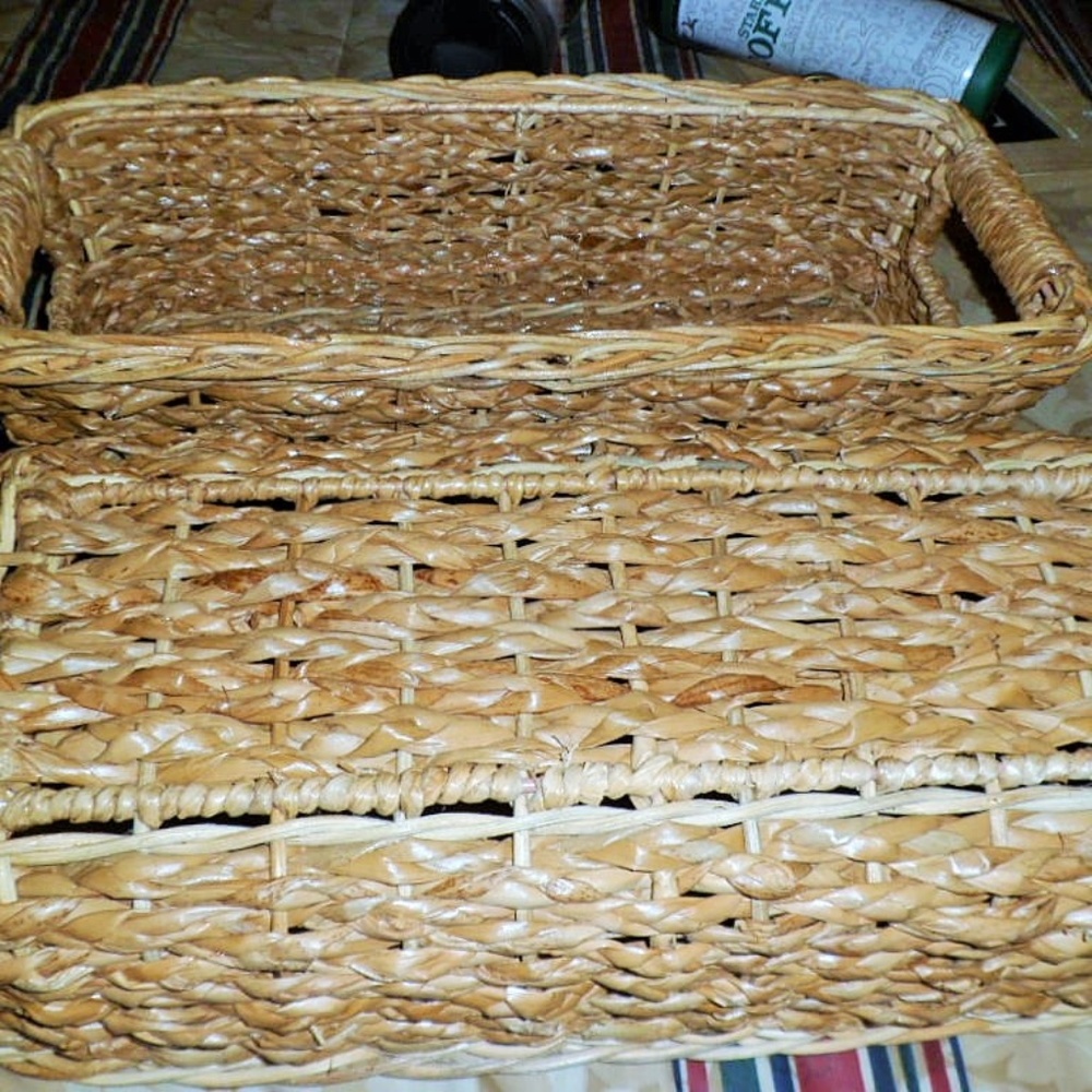 Two Brown Wicker Storage Bins